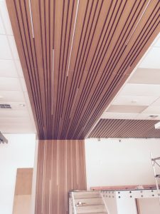 LED strip lights installed between evenly spaced timber